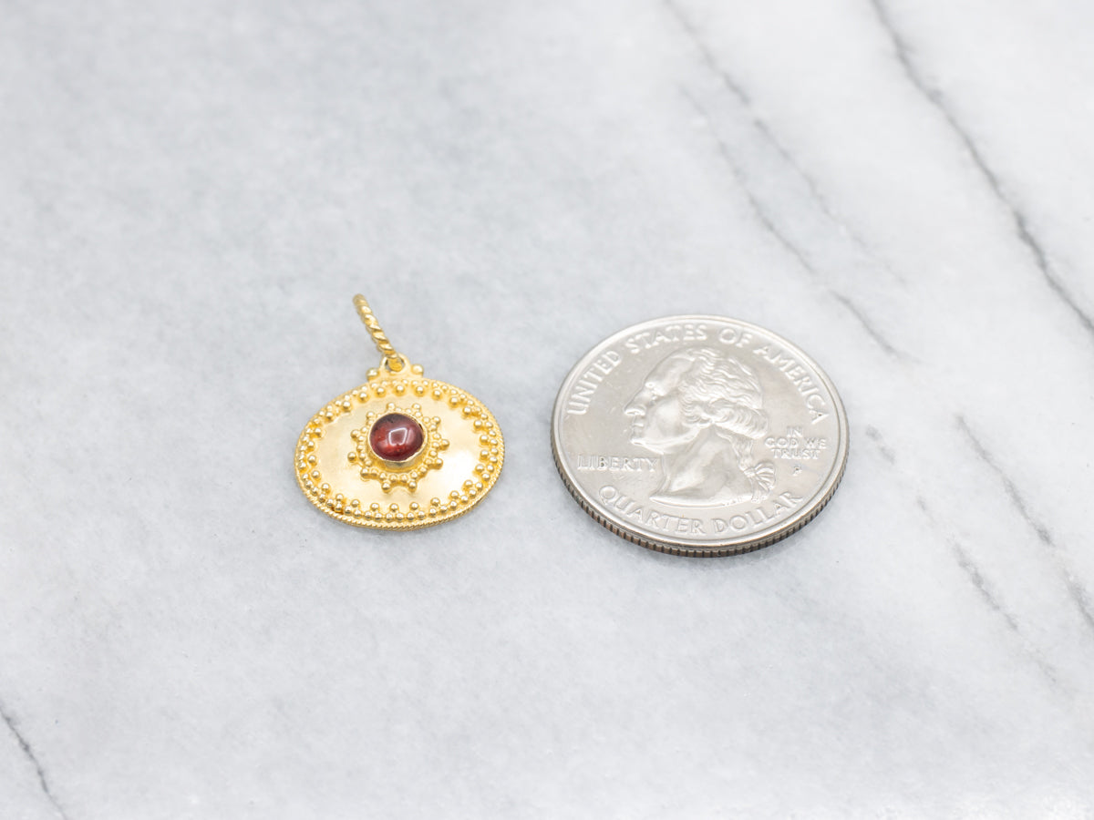 Ornate 18-Karat Gold Garnet Cabochon Pendant