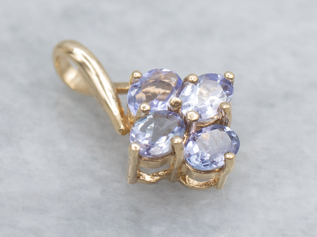 Oval Cut Tanzanite Gold Pendant with Twisted Bail