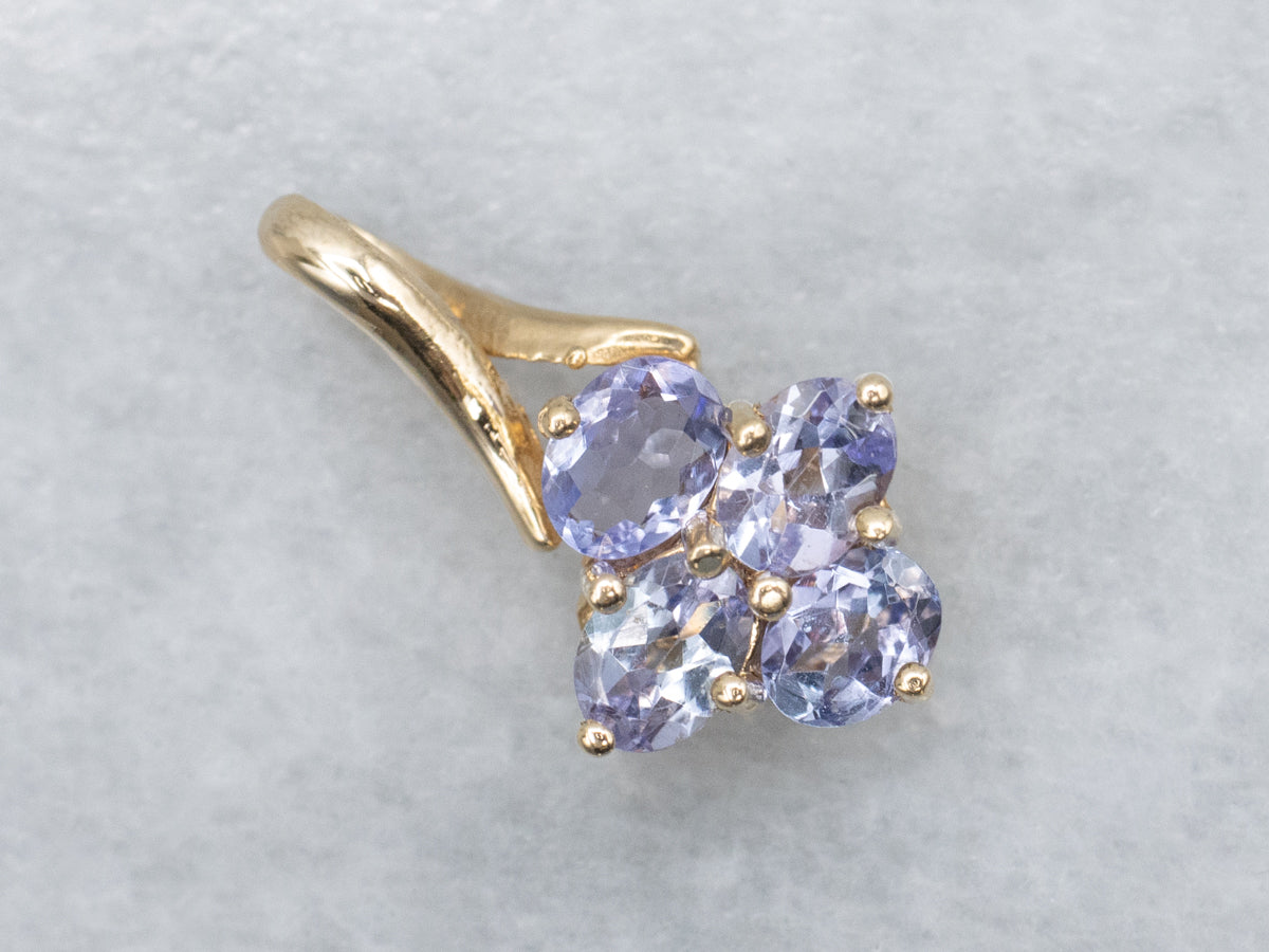 Oval Cut Tanzanite Gold Pendant with Twisted Bail