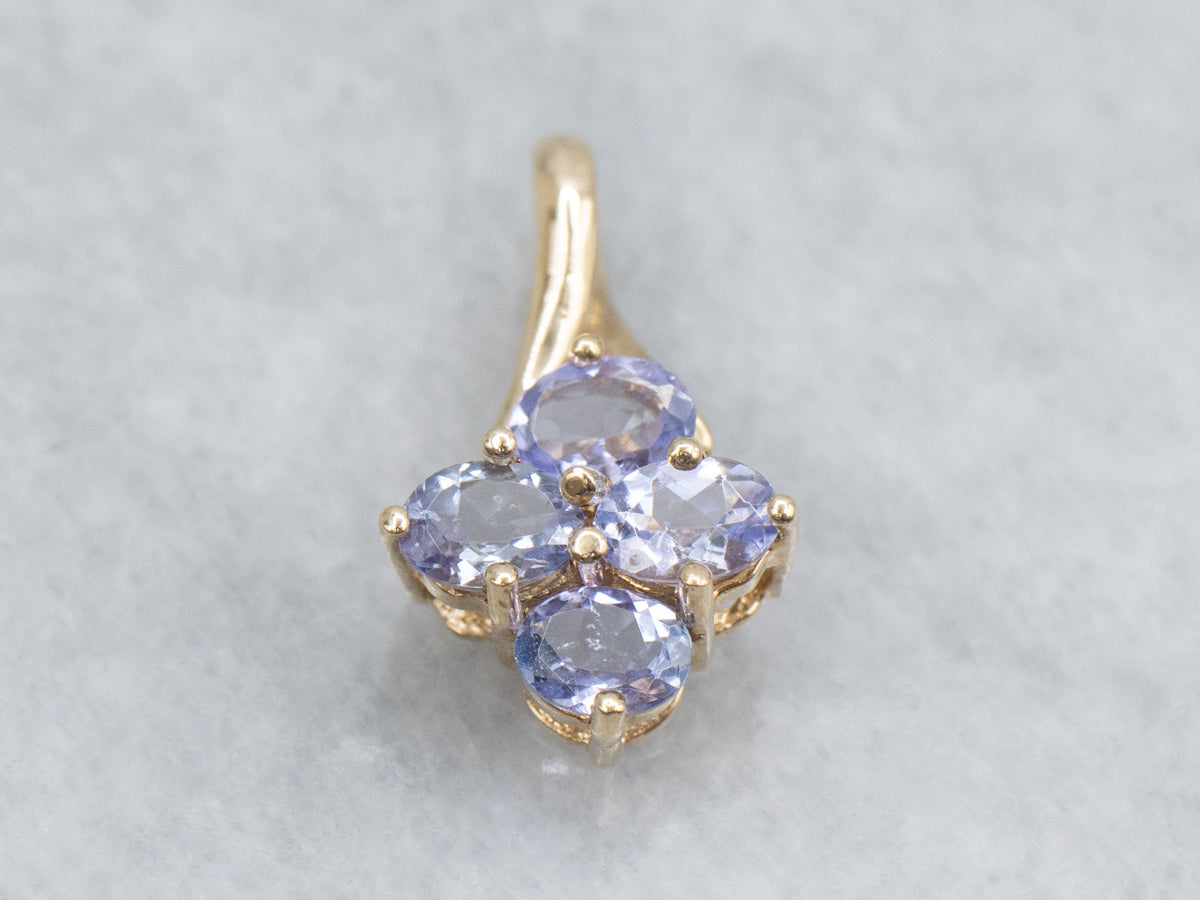Oval Cut Tanzanite Gold Pendant with Twisted Bail