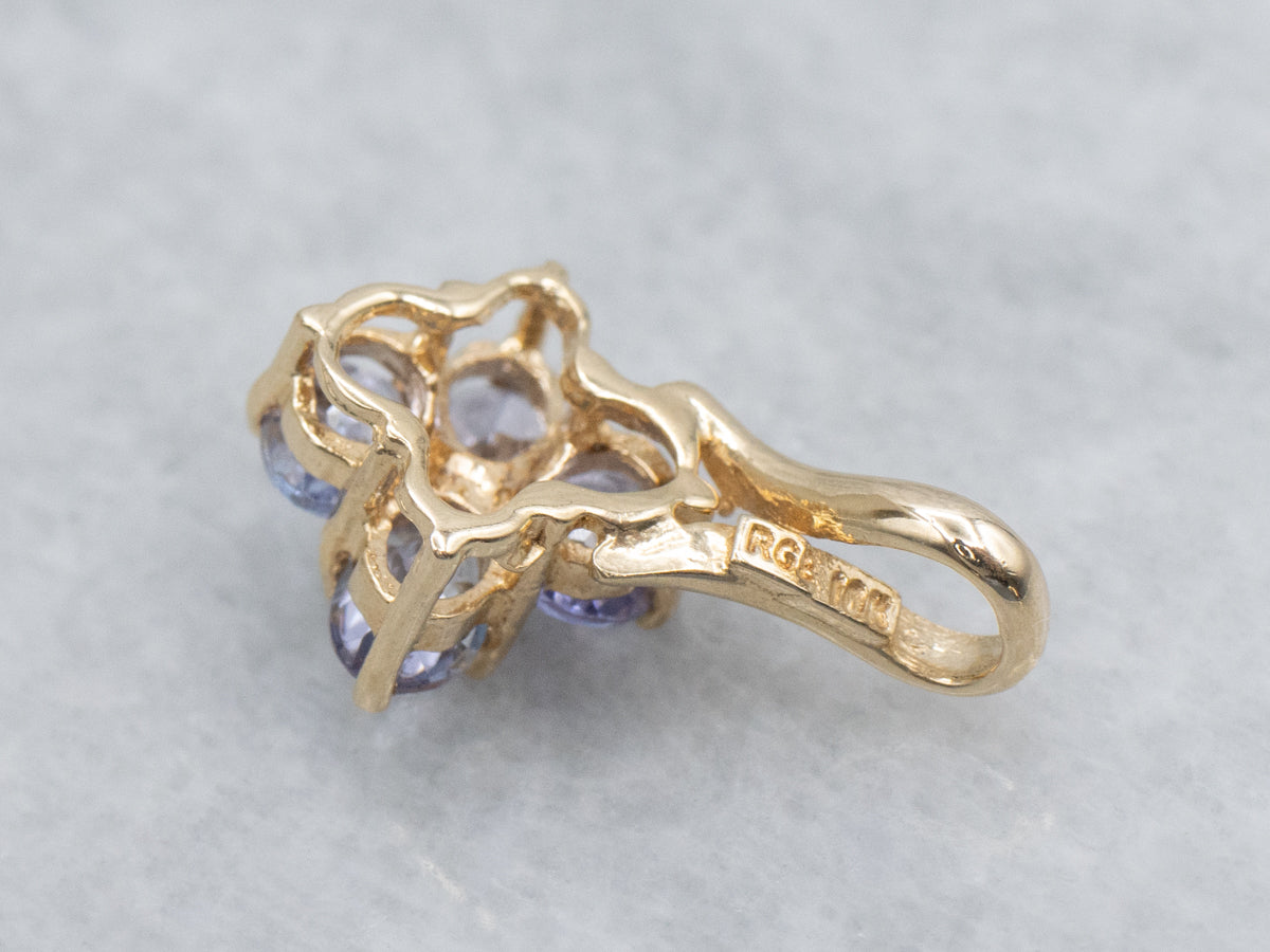 Oval Cut Tanzanite Gold Pendant with Twisted Bail