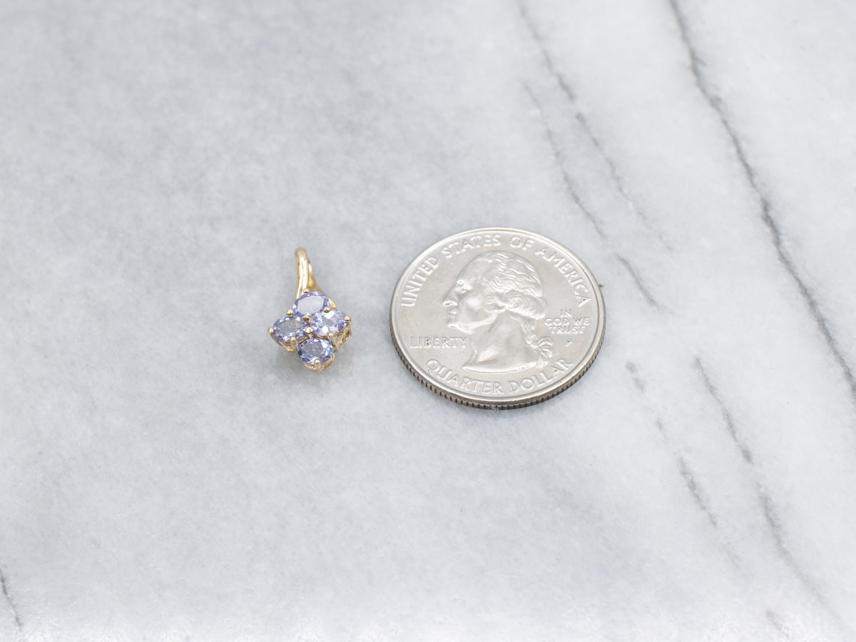 Oval Cut Tanzanite Gold Pendant with Twisted Bail