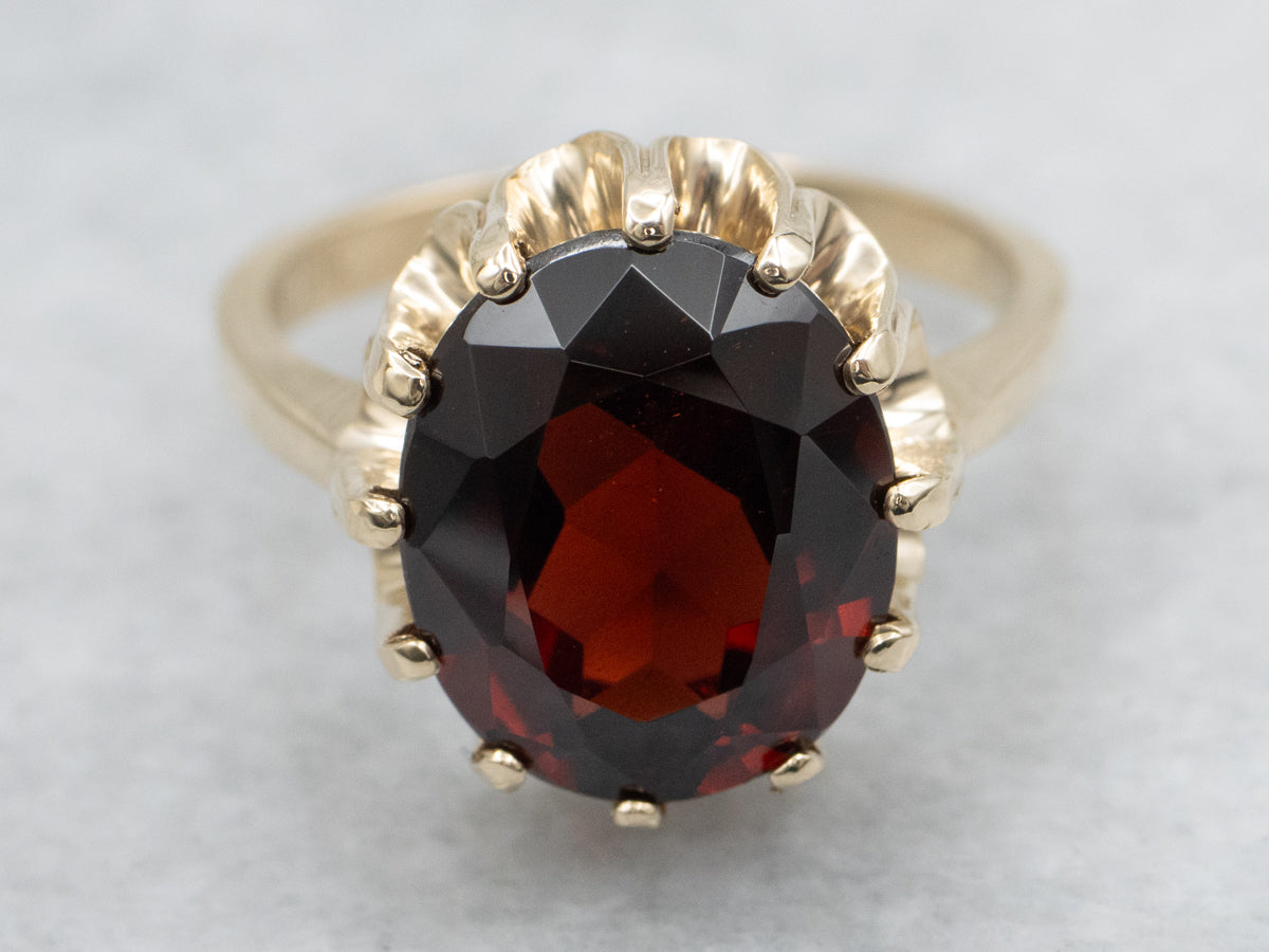 Oval Cut Garnet Yellow Gold Solitaire Ring