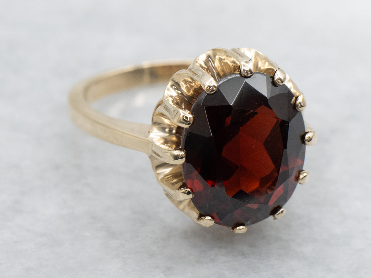Oval Cut Garnet Yellow Gold Solitaire Ring