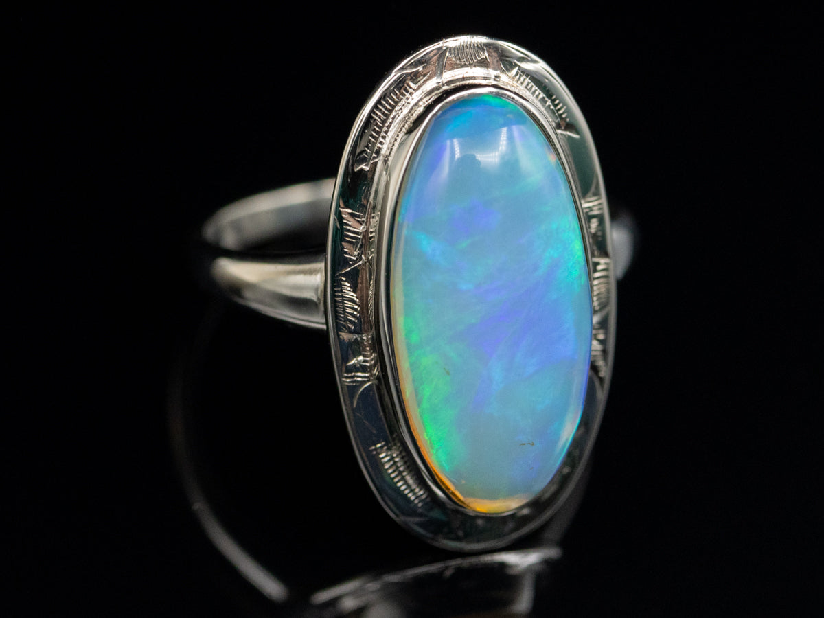 Opal Cabochon in Vintage White Gold Etched Bezel Setting