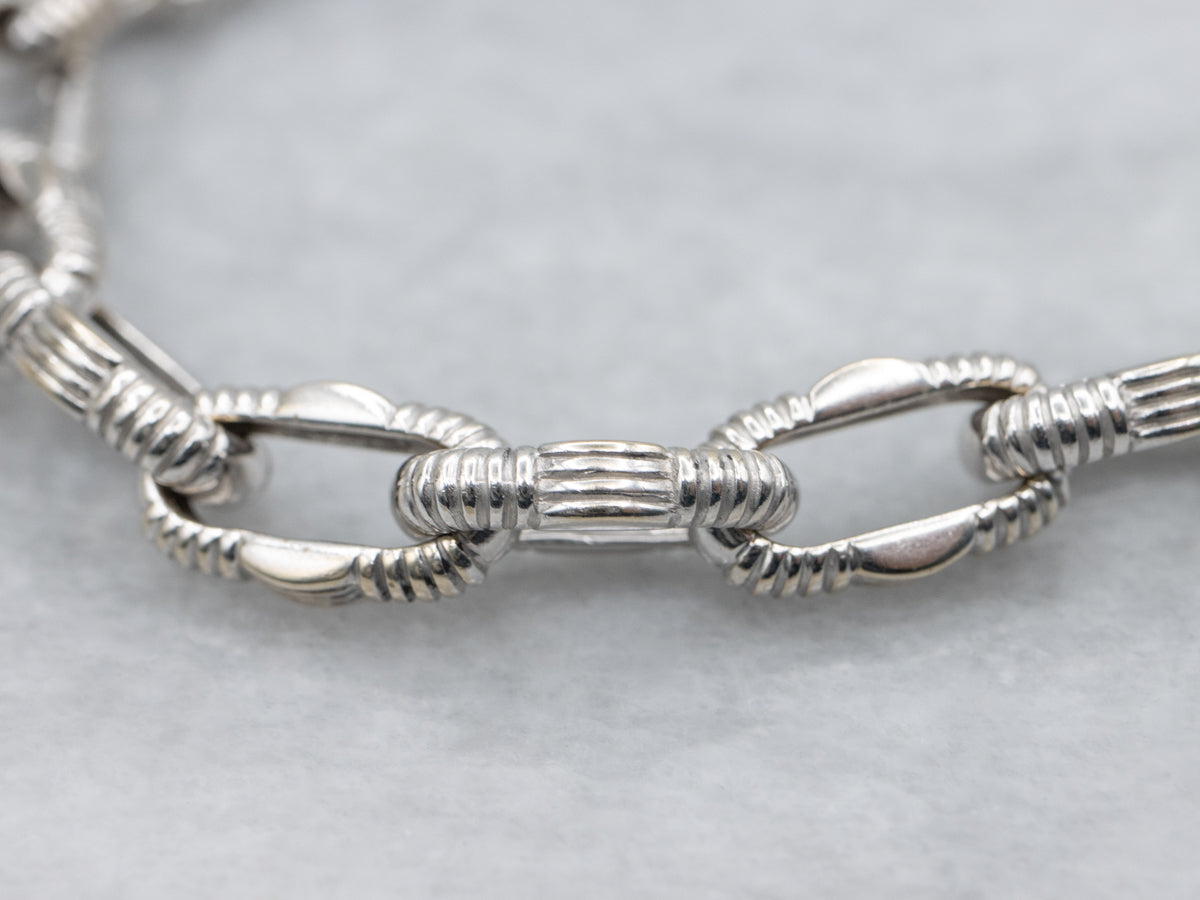 White Gold Nautical Link Bracelet with Diamond Clasp and Ruby Accent