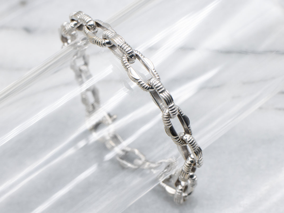 White Gold Nautical Link Bracelet with Diamond Clasp and Ruby Accent