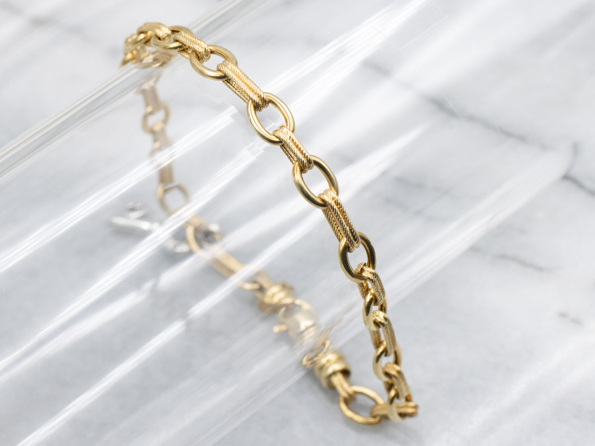 Italian 18-Karat Gold Link Bracelet with Diamond Heart Key Charm