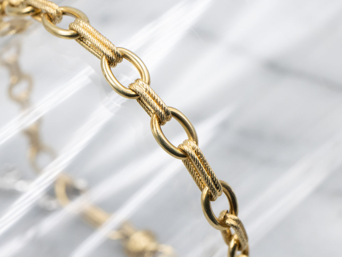 Italian 18-Karat Gold Link Bracelet with Diamond Heart Key Charm