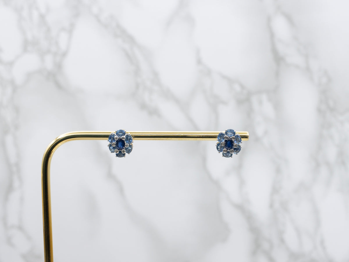 Cool-Hued Blue Sapphire and Diamond Halo Stud Earrings