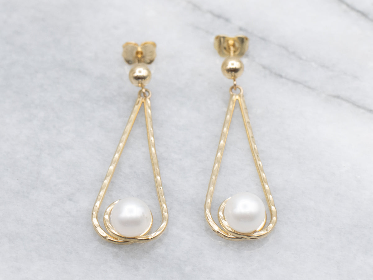 Swinging Gold and Pearl Drop Earrings