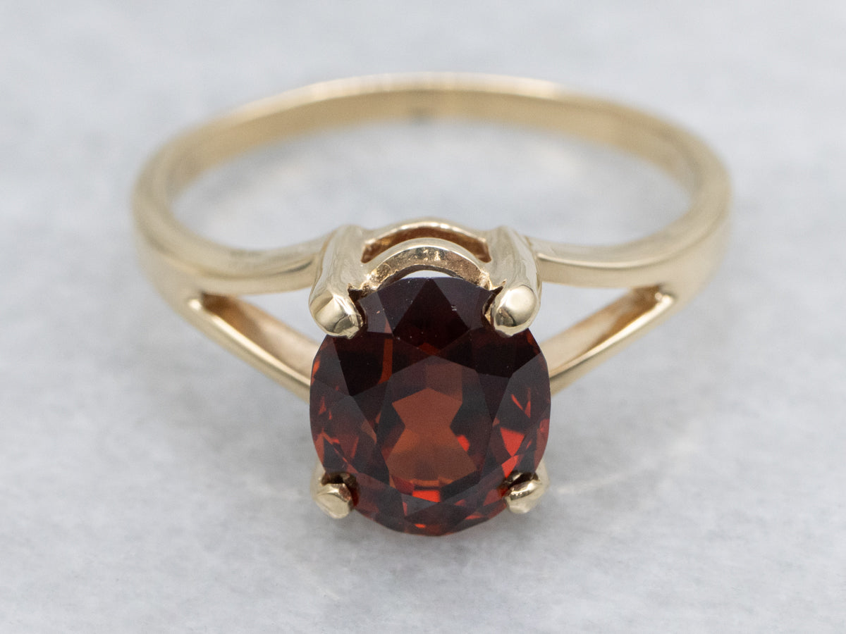 Oval Cut Garnet Yellow Gold Solitaire Ring