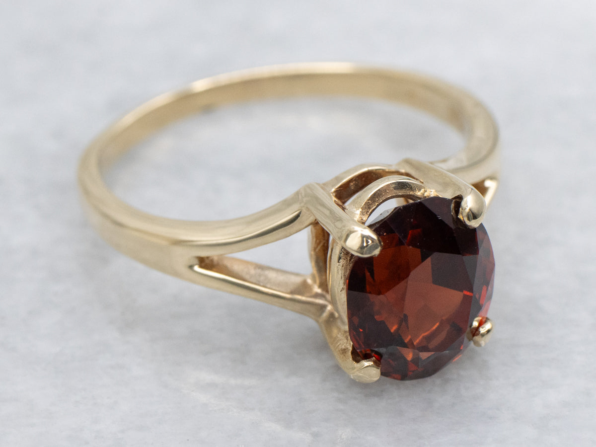 Oval Cut Garnet Yellow Gold Solitaire Ring