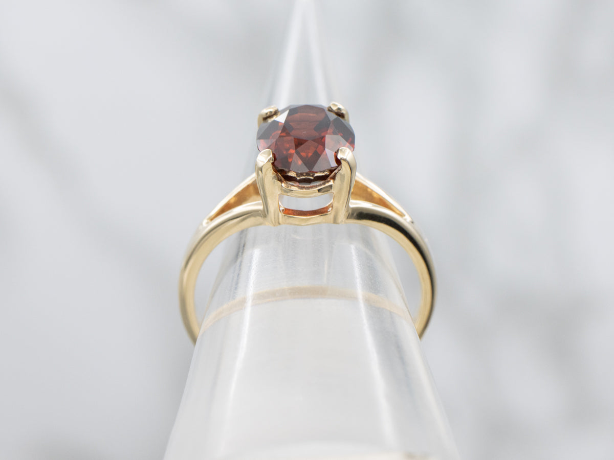 Oval Cut Garnet Yellow Gold Solitaire Ring