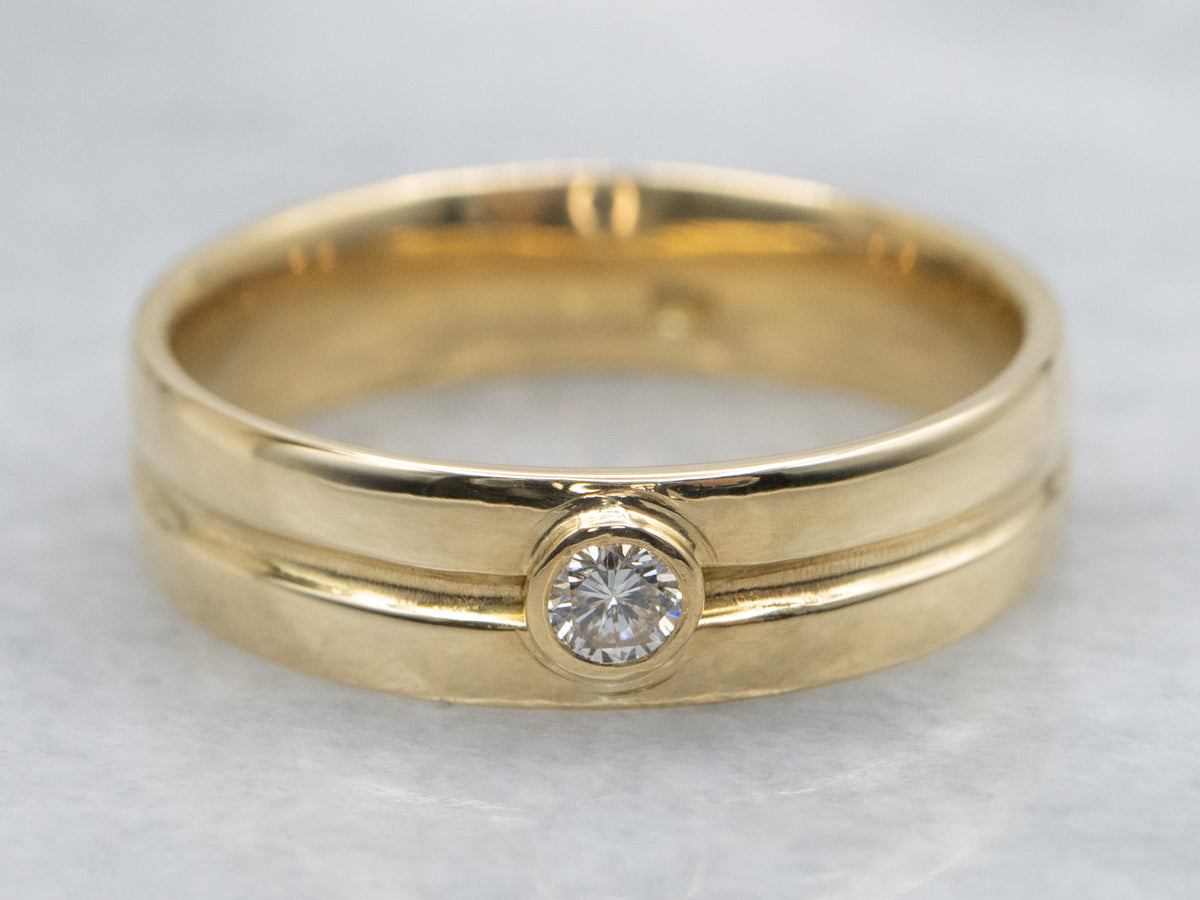 Sleek 18-Karat Gold Bezel-Set Diamond Band