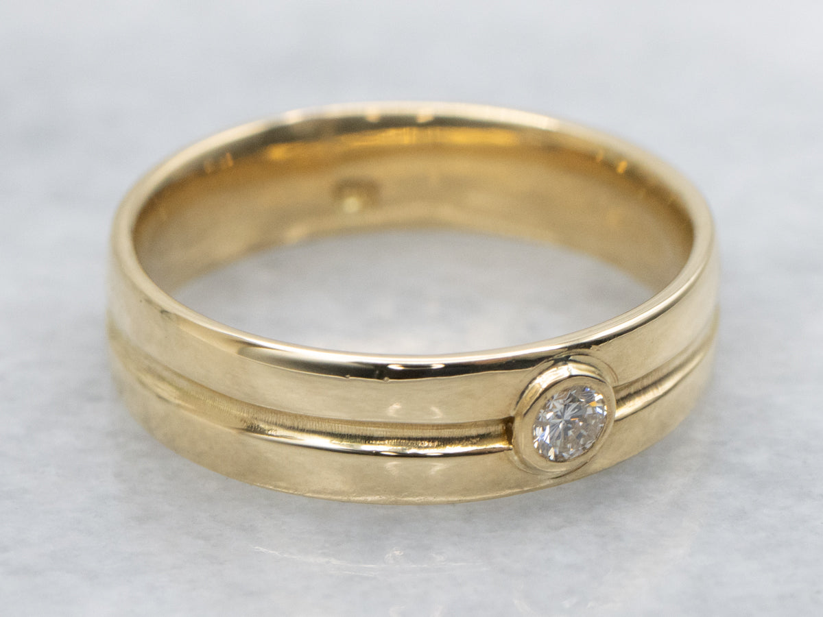 Sleek 18-Karat Gold Bezel-Set Diamond Band