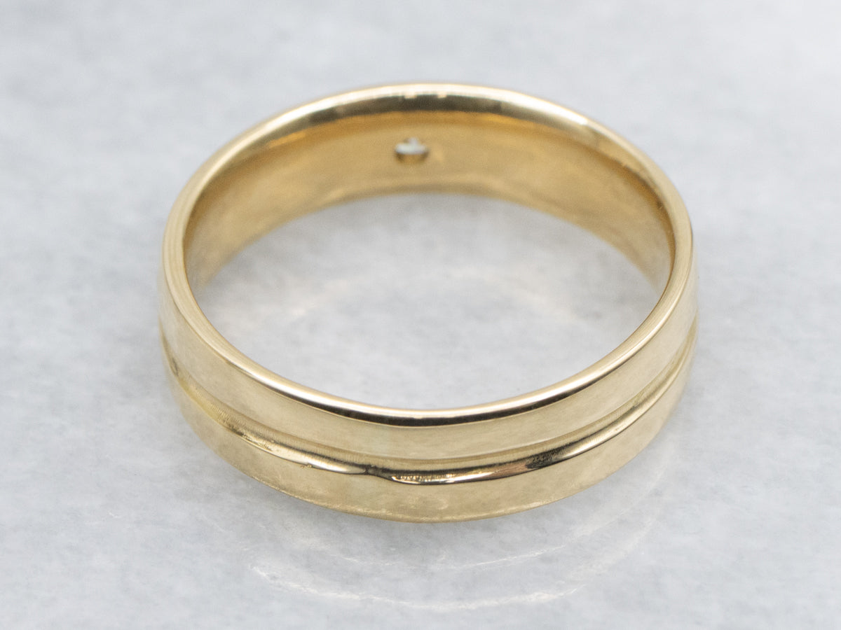 Sleek 18-Karat Gold Bezel-Set Diamond Band