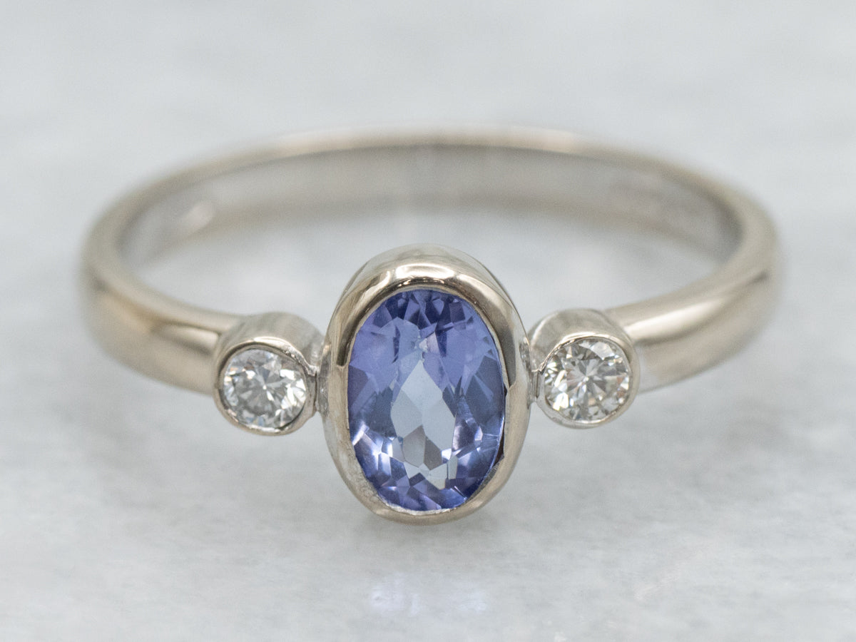 Modern Bezel-Set Tanzanite and Diamond Three Stone Ring