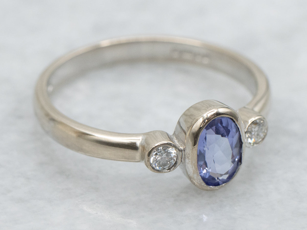 Modern Bezel-Set Tanzanite and Diamond Three Stone Ring
