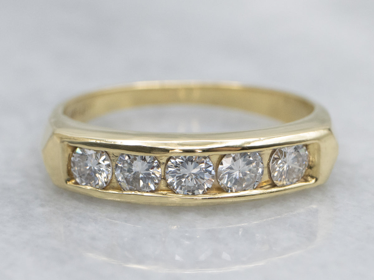 Sleek Yellow Gold Five-Diamond Band