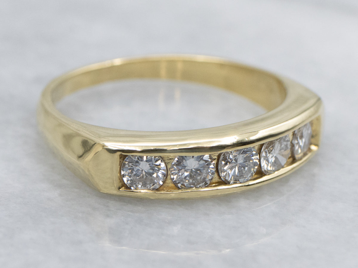 Sleek Yellow Gold Five-Diamond Band