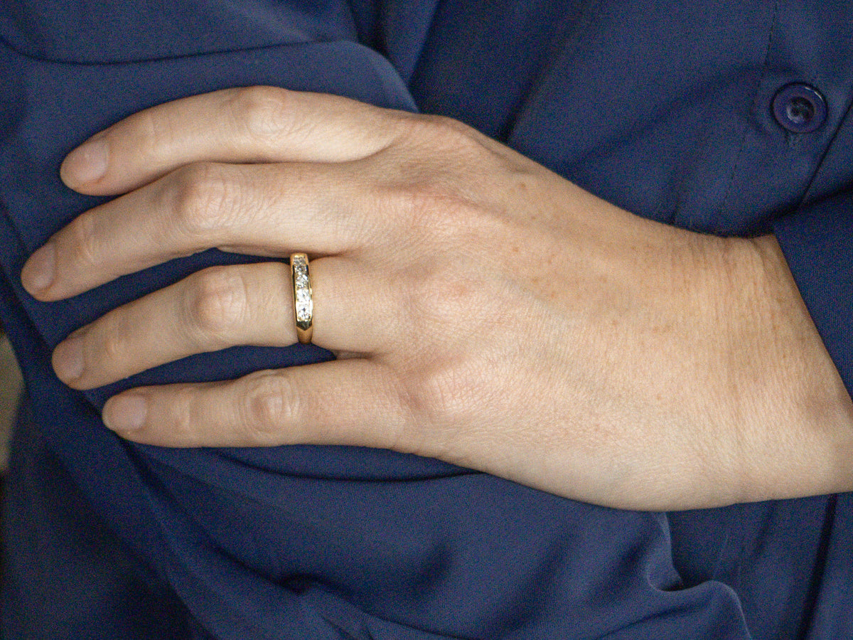 Sleek Yellow Gold Five-Diamond Band