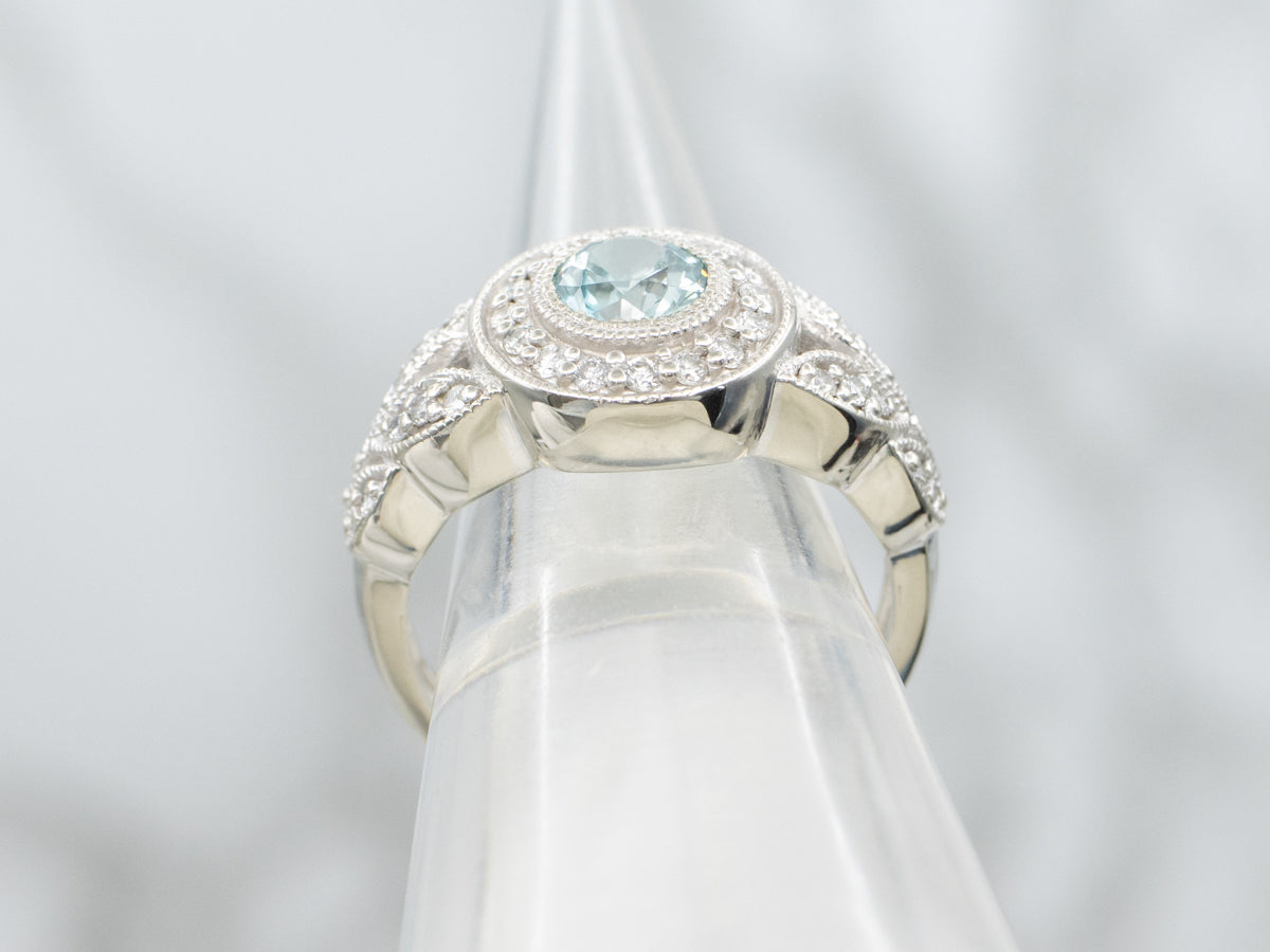 Modern Blue Zircon and Diamond Halo Ring with Split Shoulders