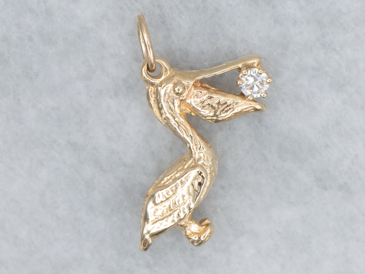 Yellow Gold Detailed Pelican Pendant with Diamond in Mouth