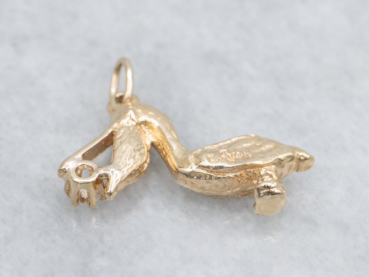 Yellow Gold Detailed Pelican Pendant with Diamond in Mouth