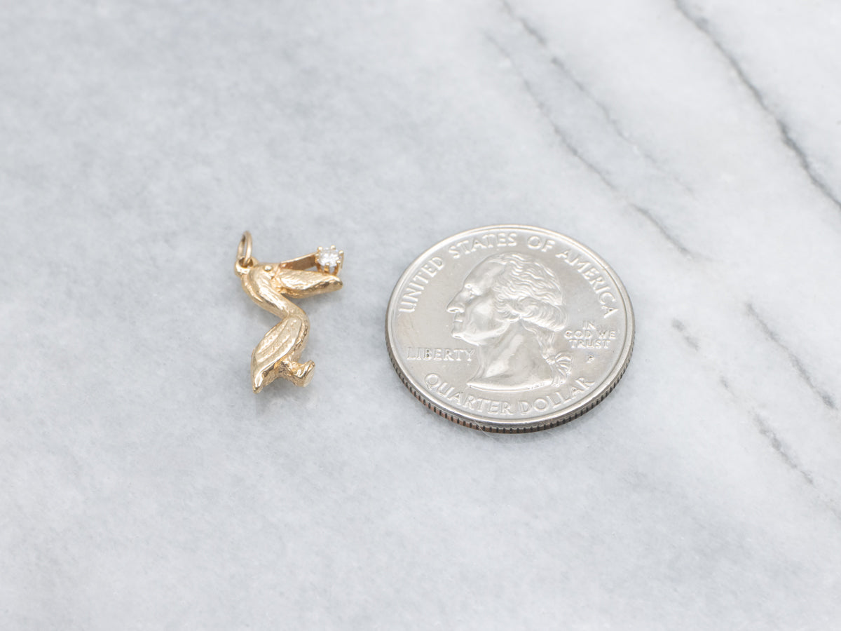 Yellow Gold Detailed Pelican Pendant with Diamond in Mouth