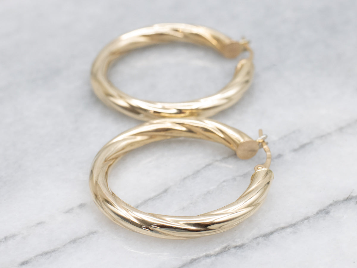 Twisting Yellow Gold Italian Hoop Earrings