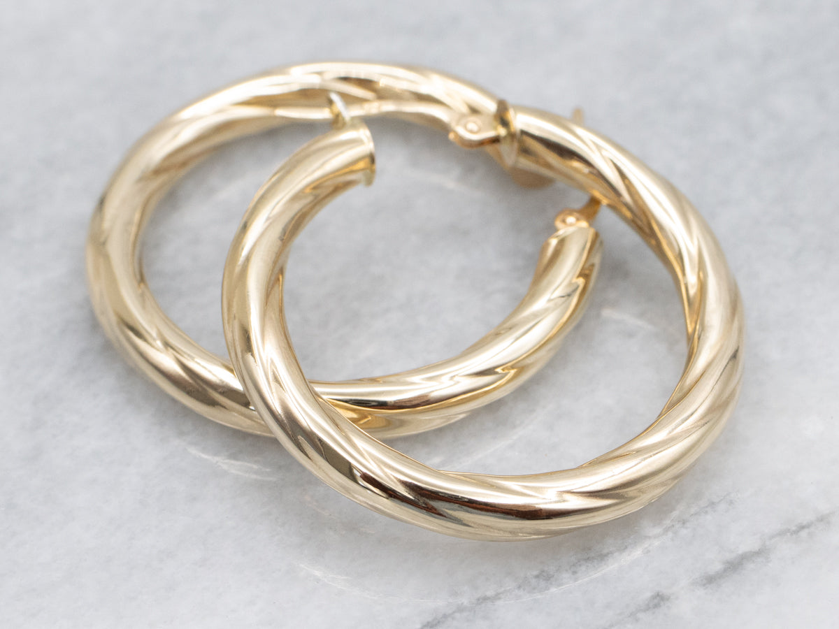 Twisting Yellow Gold Italian Hoop Earrings