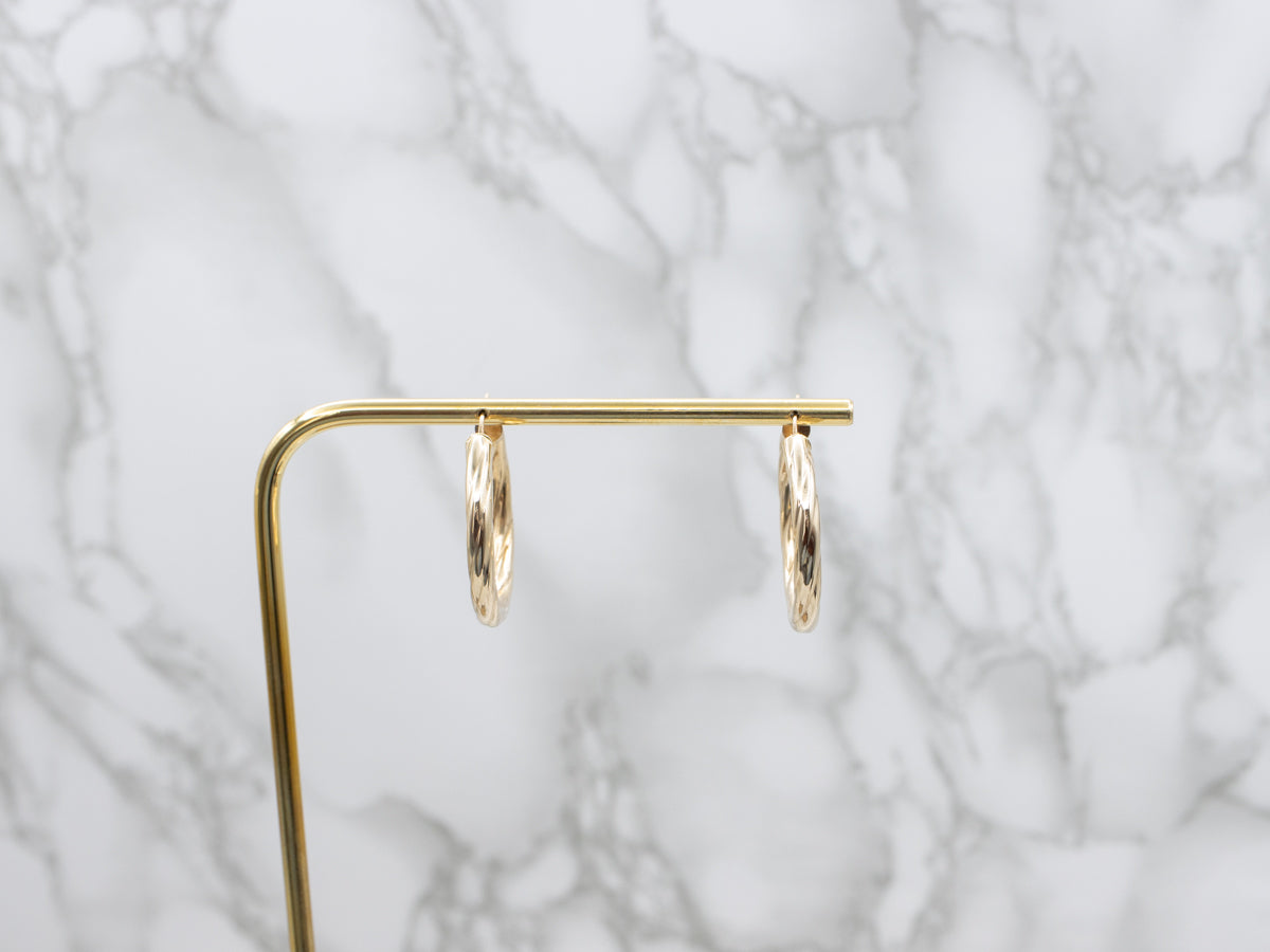 Twisting Yellow Gold Italian Hoop Earrings