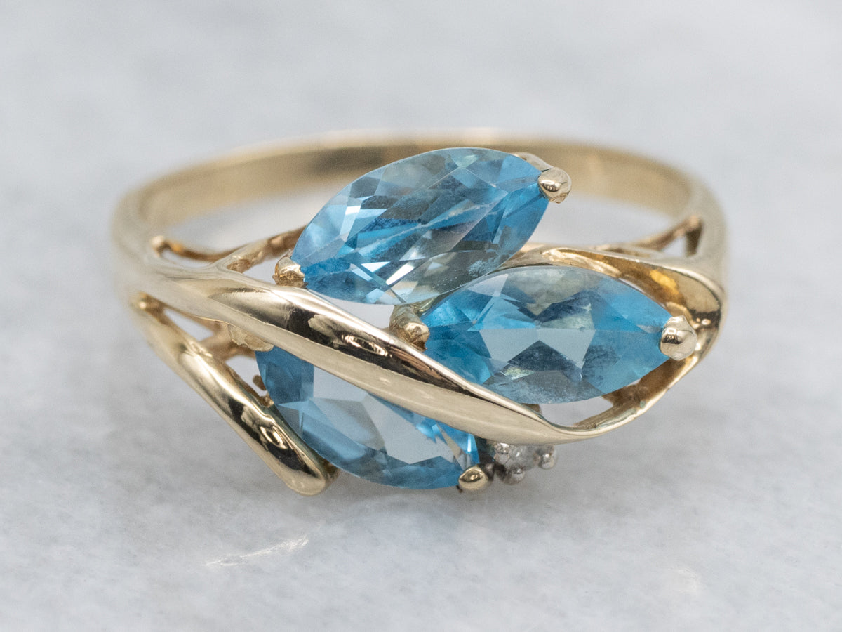 Marquise-Cut Blue Topaz and Natural Diamond Ring