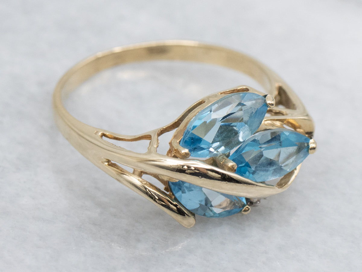 Marquise-Cut Blue Topaz and Natural Diamond Ring