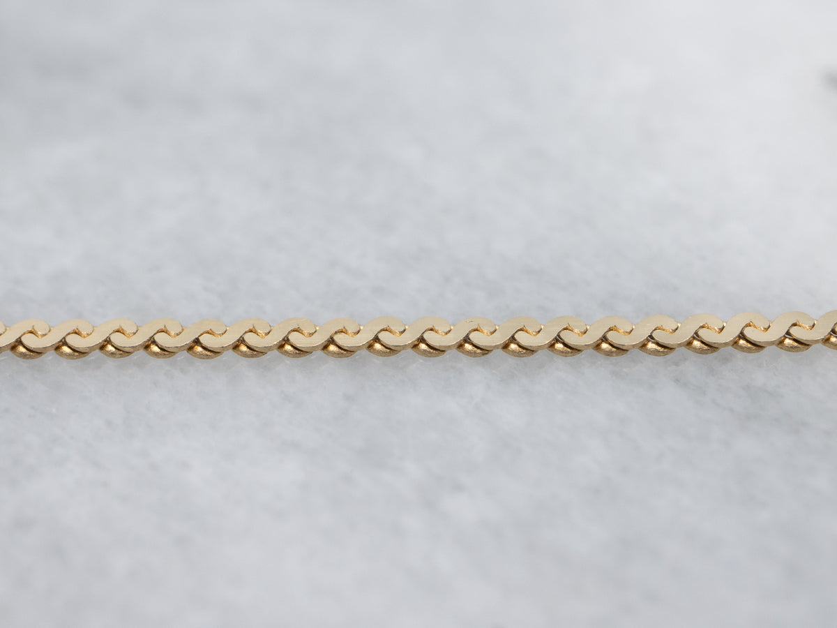Bezel-Set Diamond Yellow Gold Serpentine Necklace