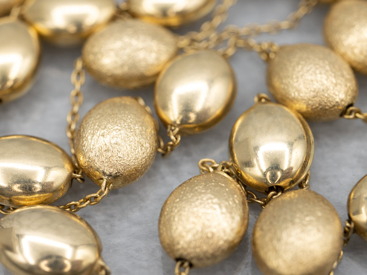 Triple Strand Textured and Polished Oval Bead Necklace