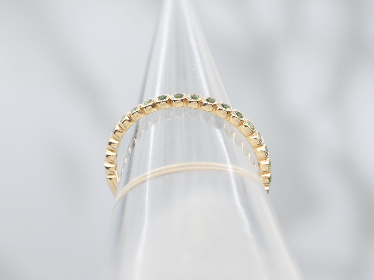 Bezel-Set Tsavorite Garnet Yellow Gold Band