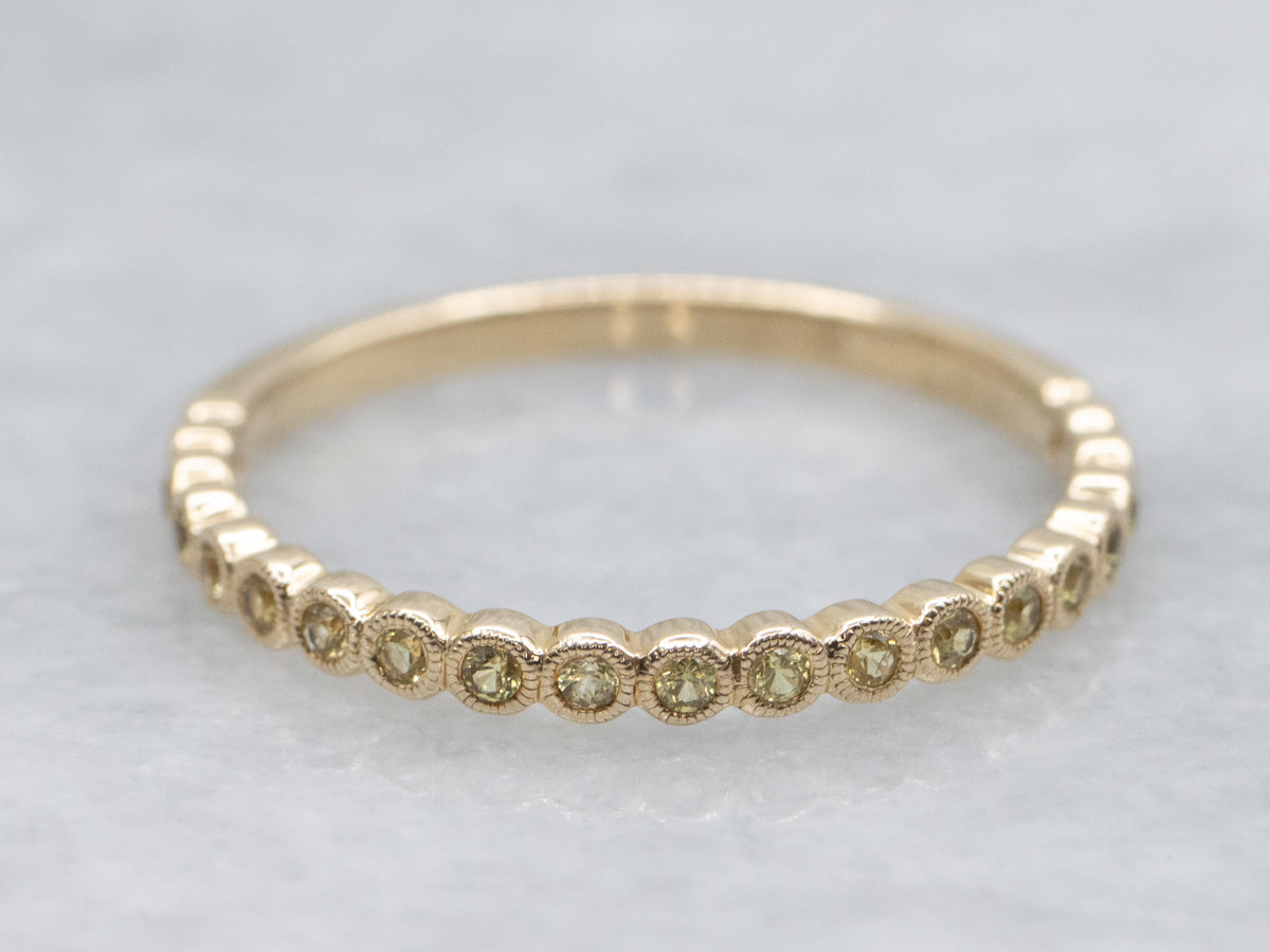 Bezel-Set Yellow Sapphire Gemstone and Gold Band