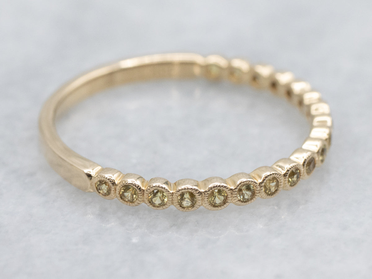 Bezel-Set Yellow Sapphire Gemstone and Gold Band