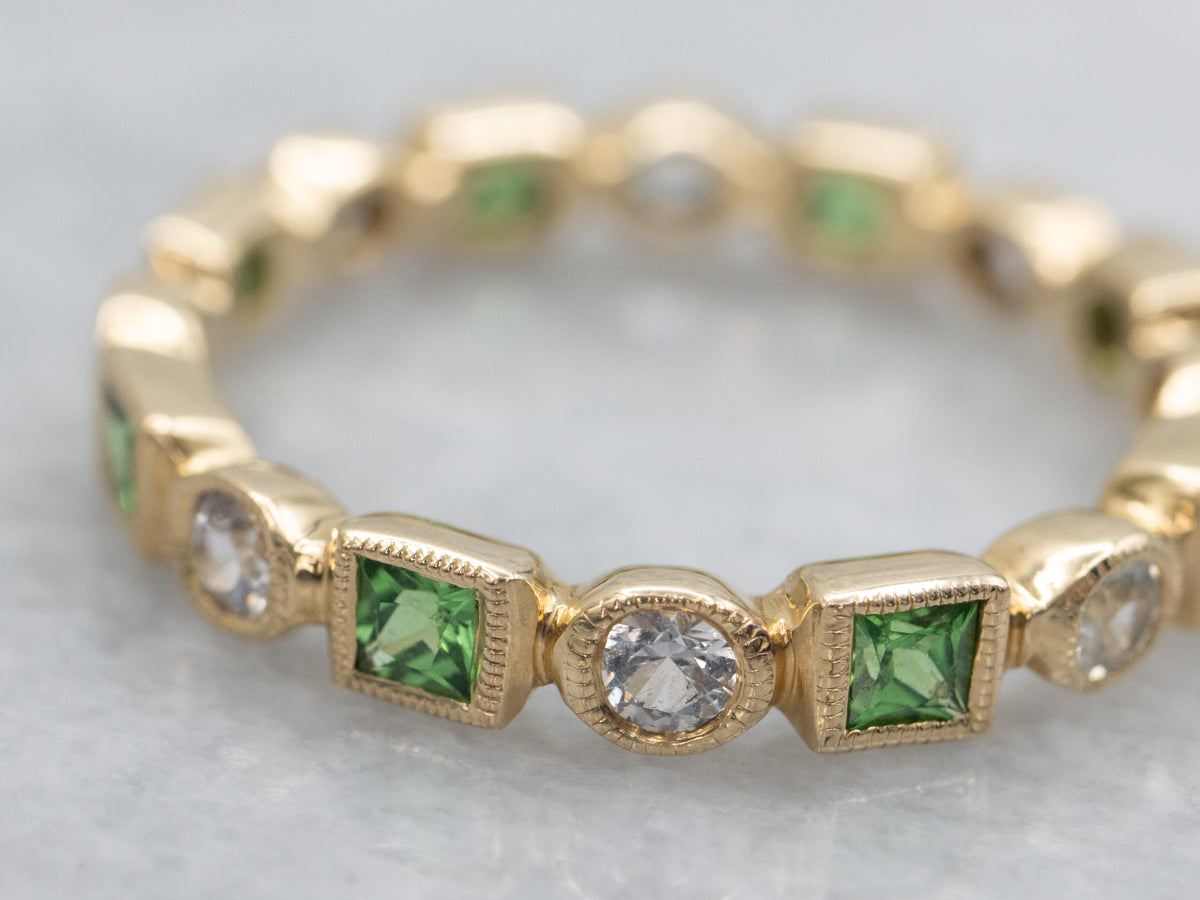 Tsavorite Garnet and White Sapphire Gold Eternity Band