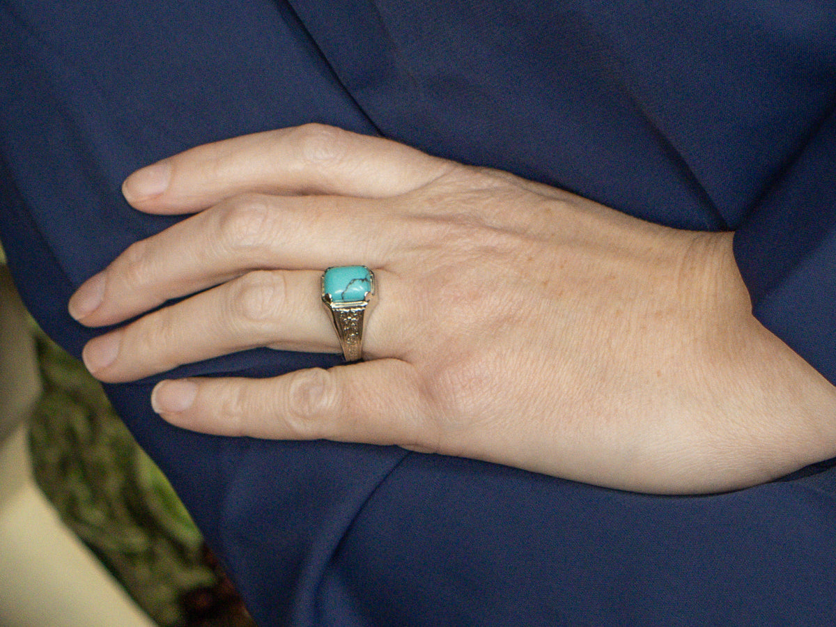 Turquoise Cabochon in Antique Engraved Floral Pattern Setting