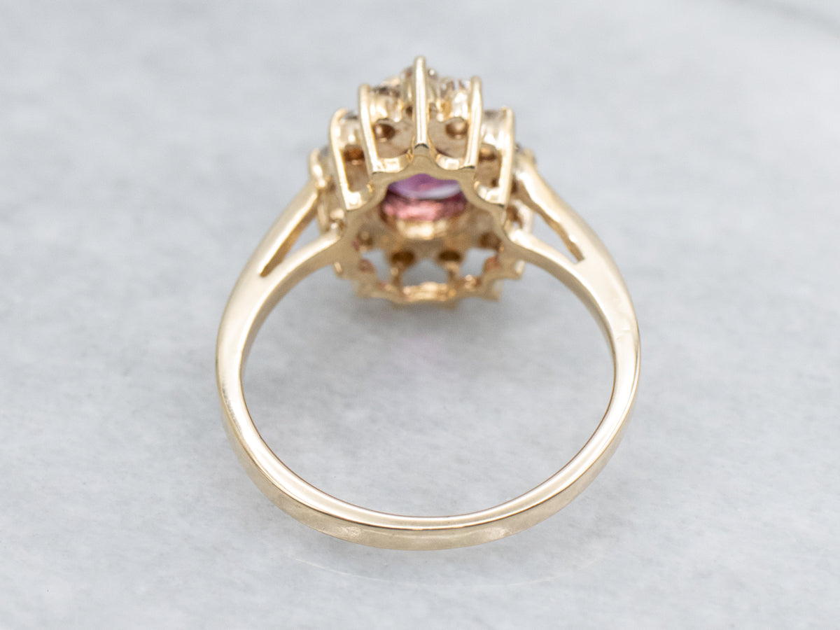 Pear-Cut Garnet and Diamond Halo Yellow Gold Ring