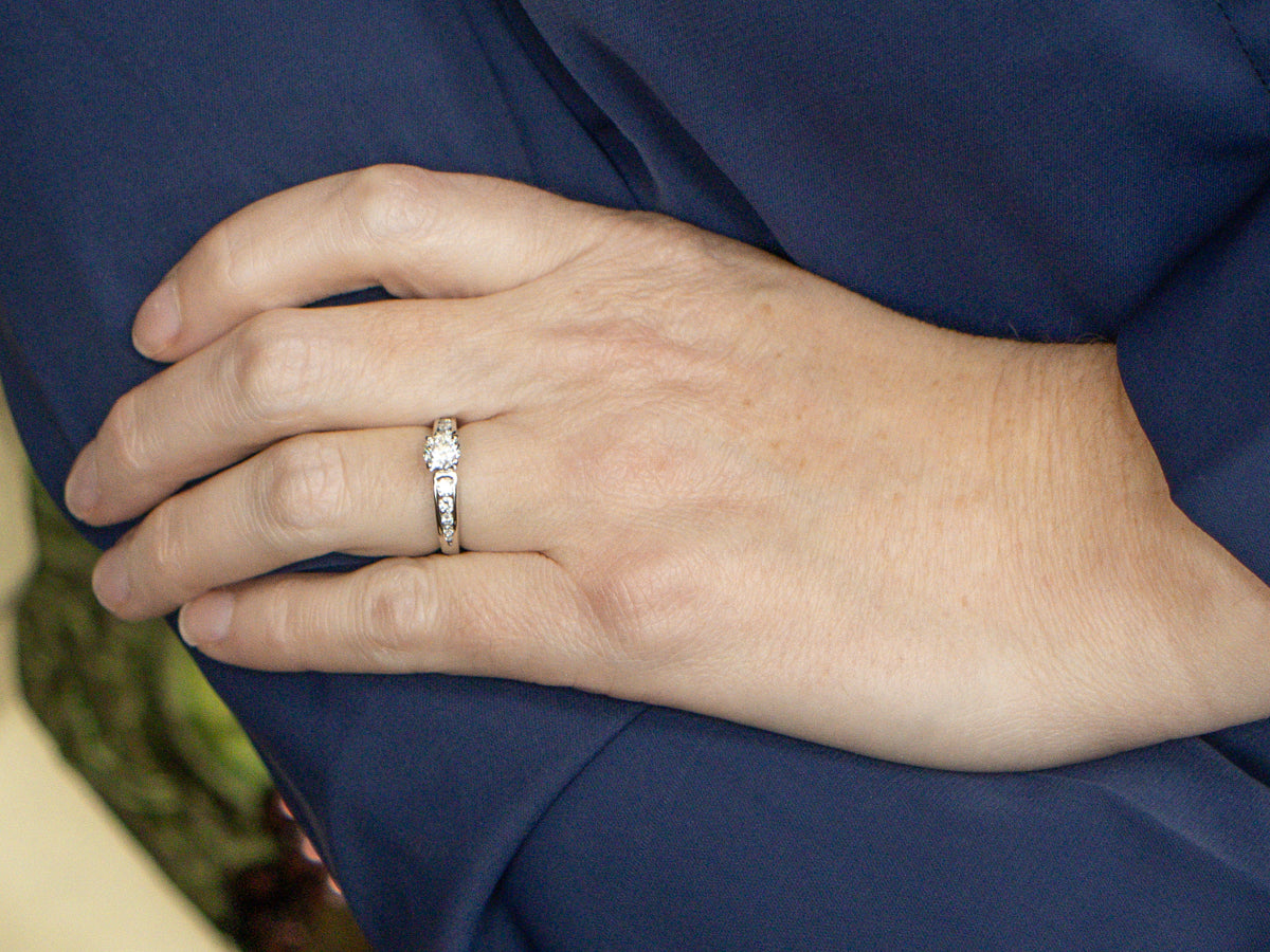 Modern Round Brilliant Diamond Engagement Ring with Channel Set Diamonds