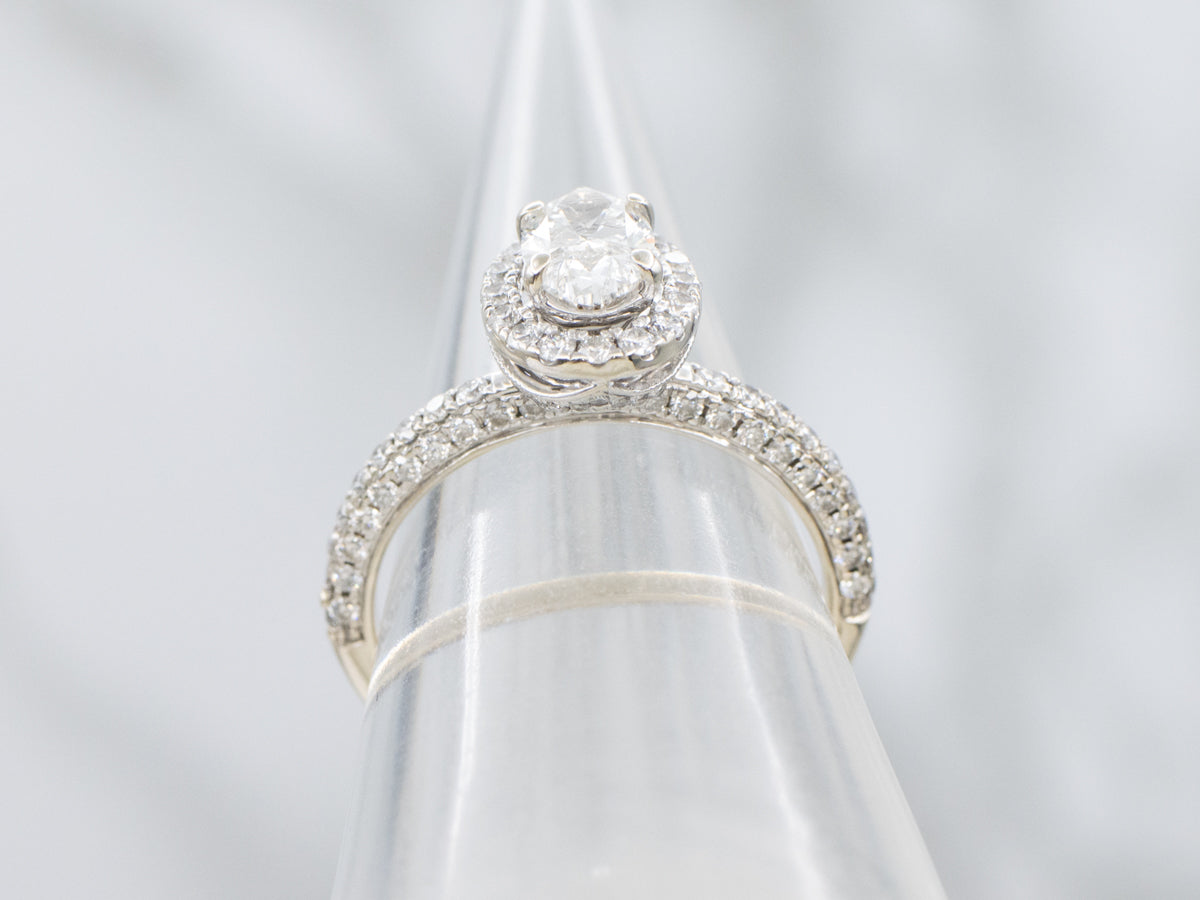 Modern Oval Diamond Halo Engagement Ring with Rose Gold Highlights