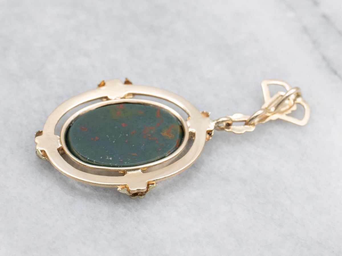 Bloodstone Cabochon in Vintage Floral Yellow Gold Pendant Setting
