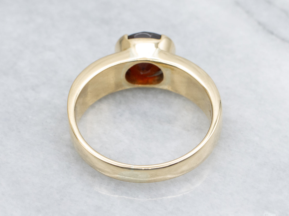 Men's East-to-West Set Garnet Scrolling Engraved Yellow Gold Solitaire Ring