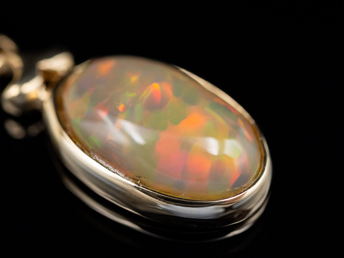 Bezel-Set Opal Cabochon Yellow Gold Pendant