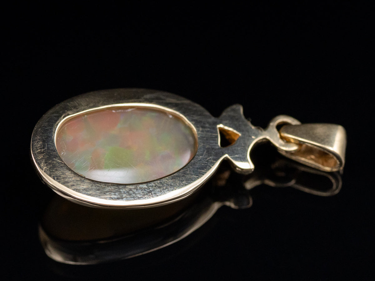Bezel-Set Opal Cabochon Yellow Gold Pendant