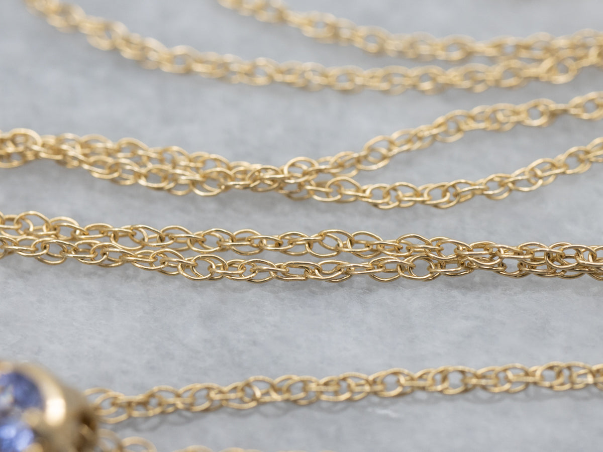 Floral Tanzanite and Diamond Gold Pendant Necklace